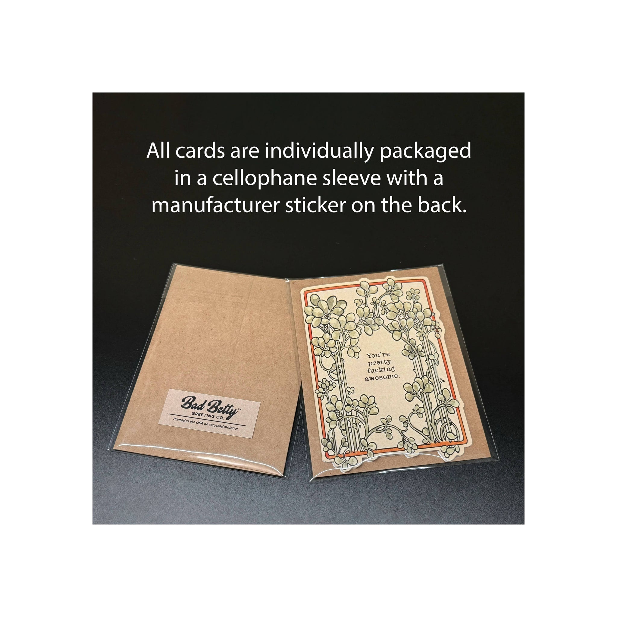 Greeting card in clear cellophane sleeve, kraft brown envelope back, floral botanical border design, front and back view