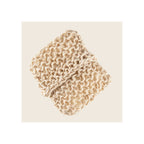 Sisal body scrubber, natural beige woven fiber, square shape, angled orientation