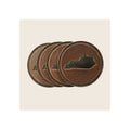 Coasters set of four round brown leather with debossed Kentucky state silhouette stacked diagonally