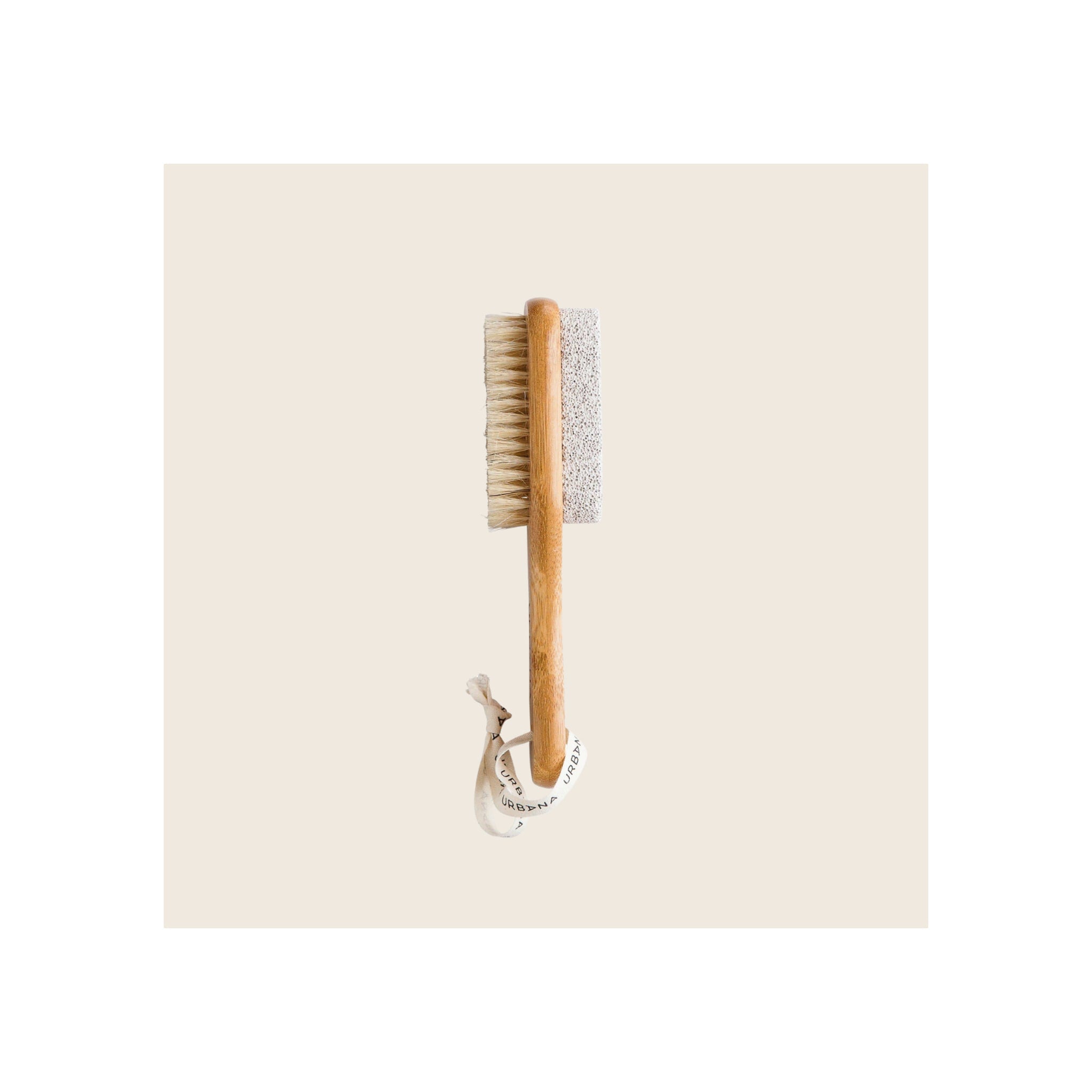 Pumice stone and nail brush with bamboo handle and natural bristles, vertical orientation