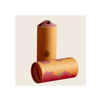 Finishing Sugar Sweet Rose two amber cylindrical tubes with pink floral label, one upright one lying flat