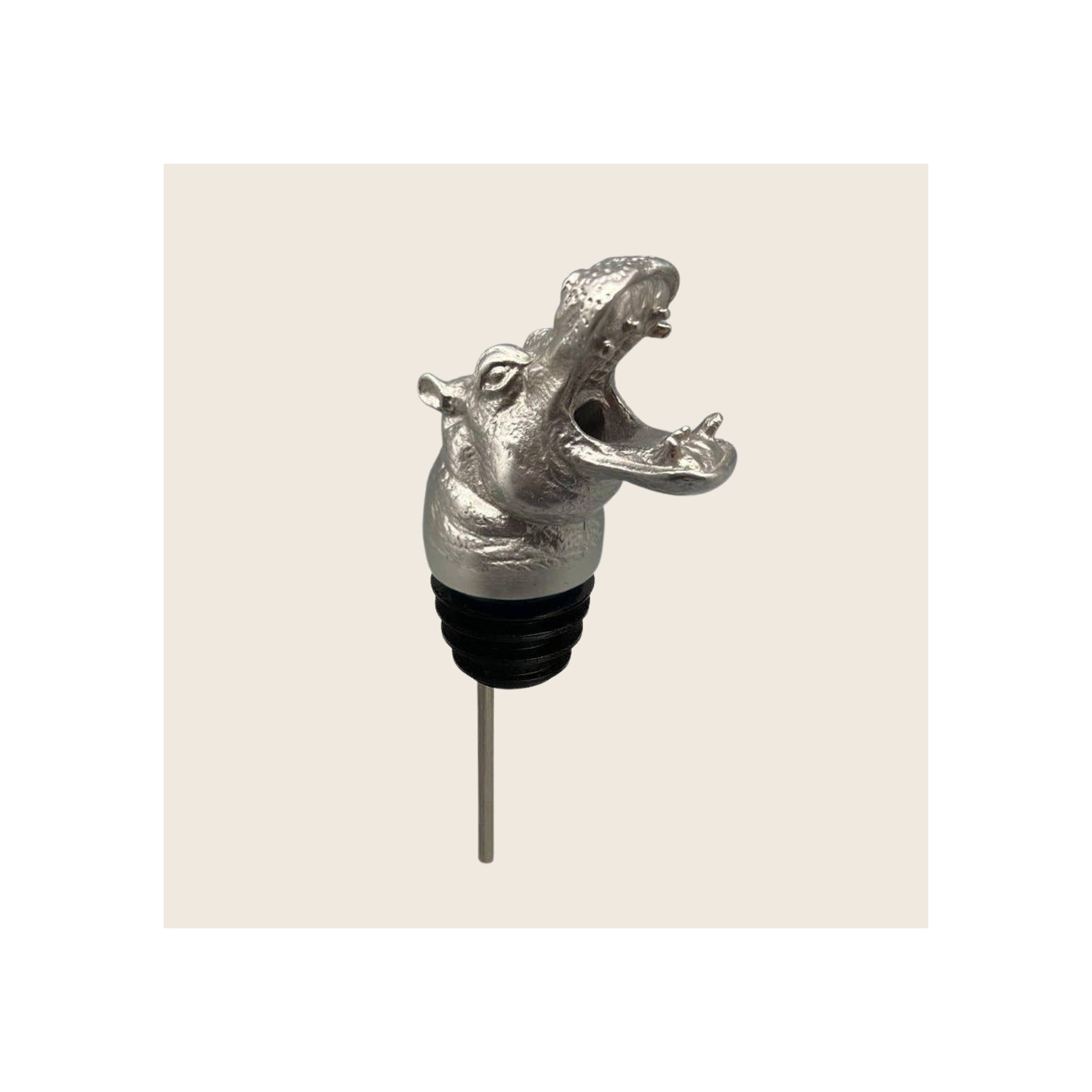 Hippo pourer with open-mouthed silver cast head, black rubber stopper, and steel spout