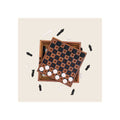 Wooden chess and checkers game set, two stacked boards top-down view, black and white pieces scattered around