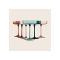 Set of six ribbed coupe glasses in multicolor pastel tones, arranged in a fan formation