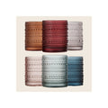 Six hobnail beaded tumbler glasses in amber, burgundy, grey, blush, sage, and navy arranged in two rows