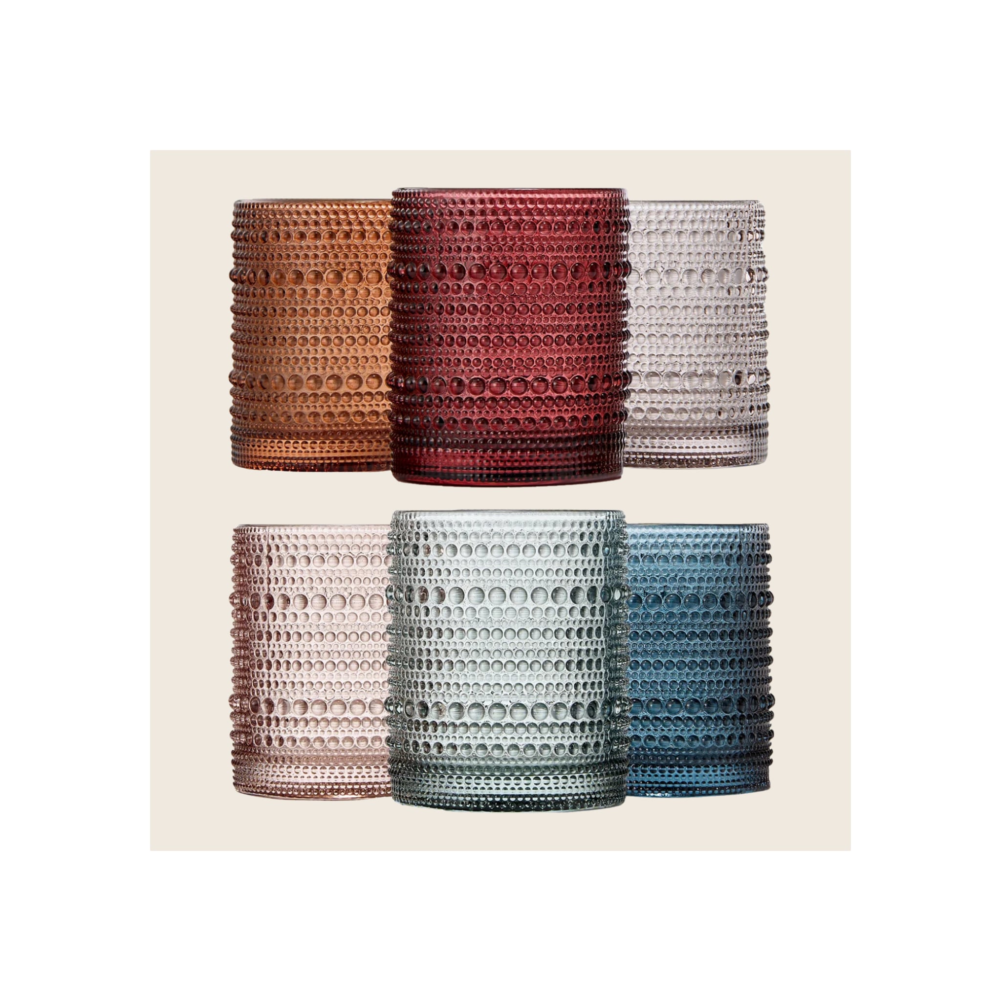 Six hobnail beaded tumbler glasses in amber, burgundy, grey, blush, sage, and navy arranged in two rows