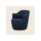 Swivel armchair in navy blue bouclé fabric with round walnut-finish base, angled three-quarter view