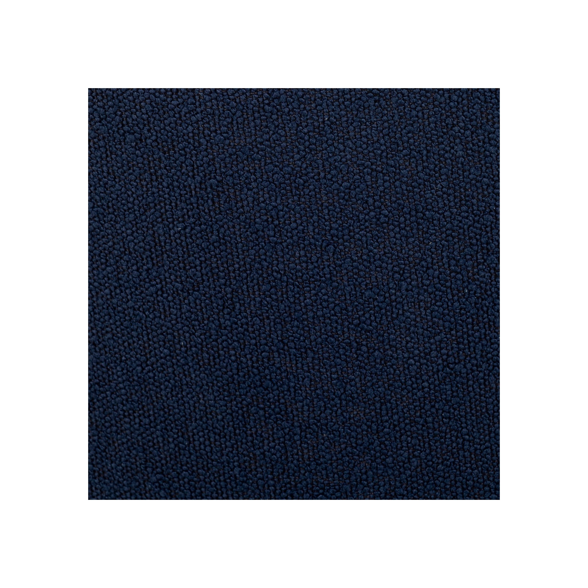 Macro fabric swatch of deep navy bouclé showing dense nubby looped texture and rich blue tone