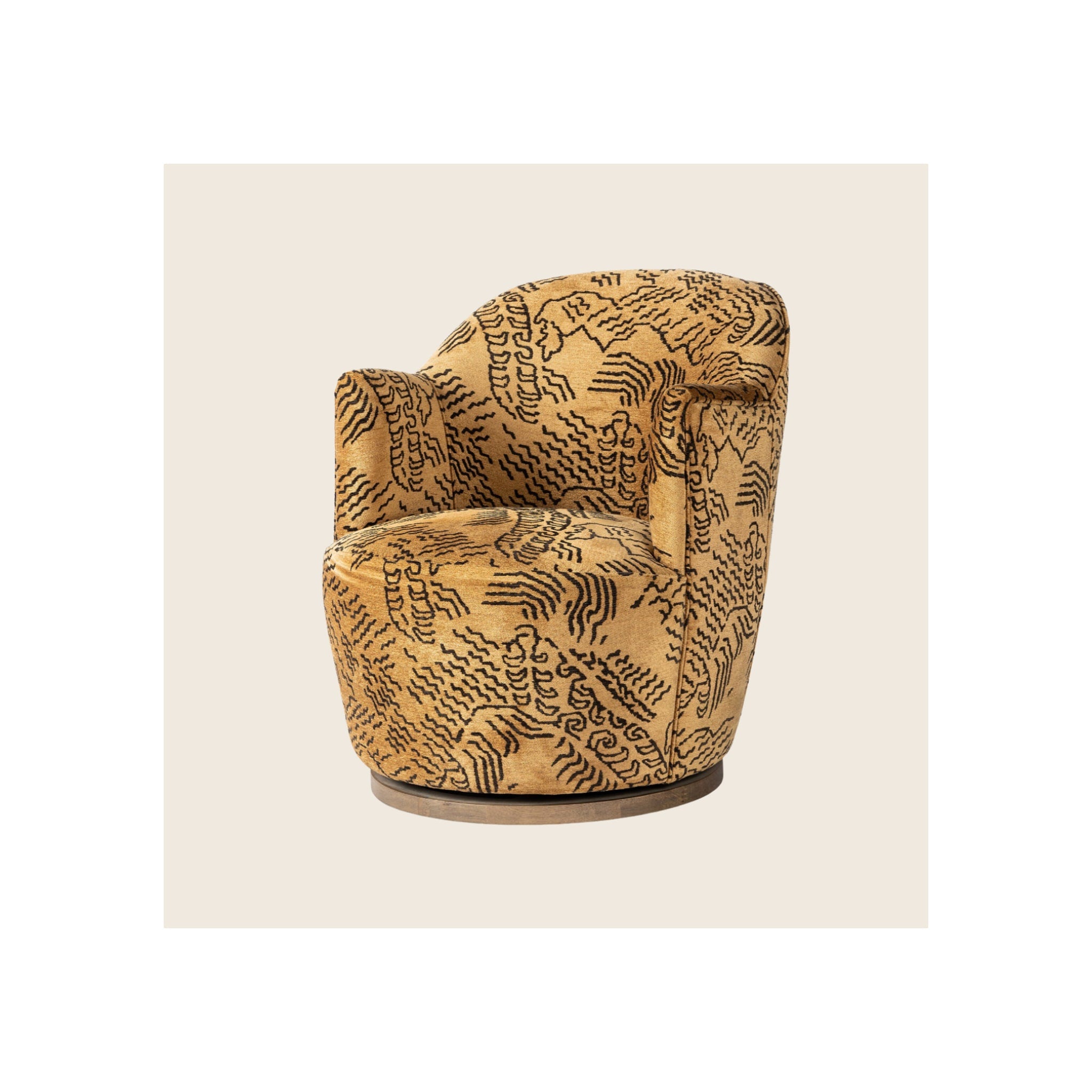 Swivel armchair in gold and black tiger-pattern velvet upholstery on round wood base, three-quarter front view