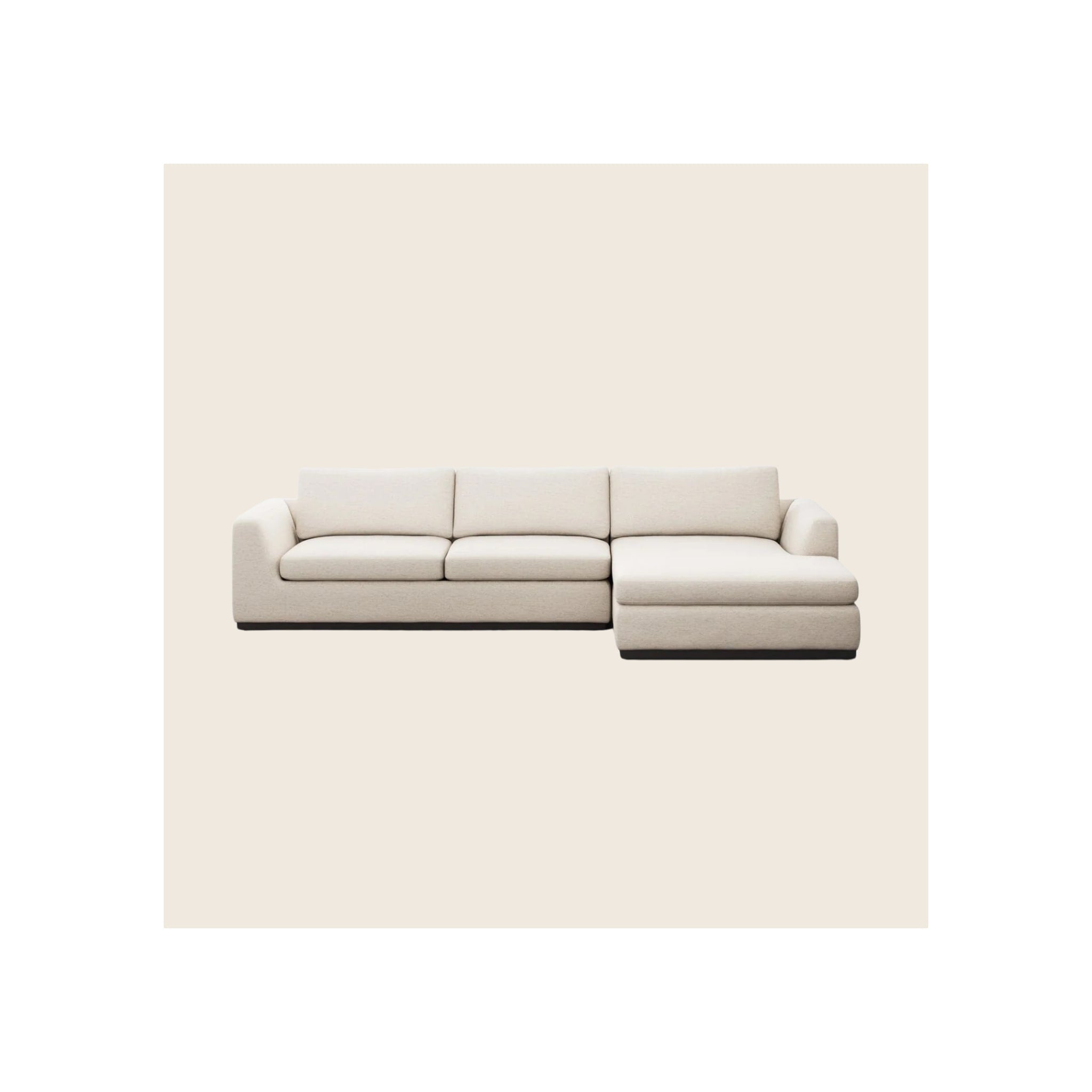 Sectional sofa in cream woven fabric with right-facing chaise and low black base