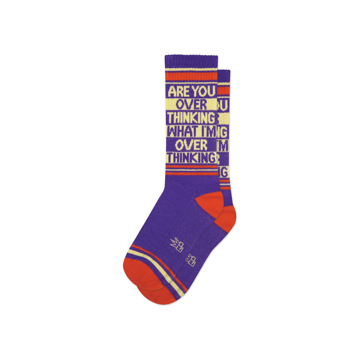 Crew socks in purple, red, and yellow with bold knitted text on cuff, flat lay pair