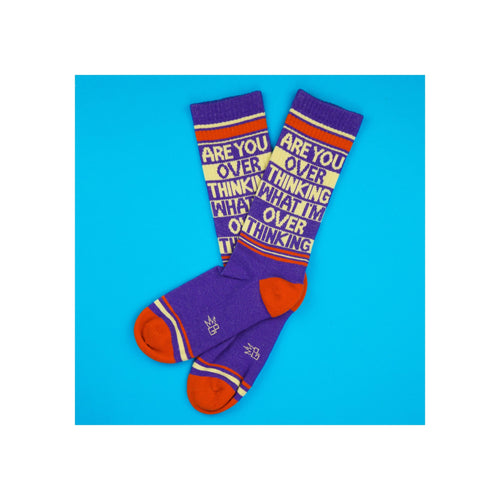 Socks, purple knit crew length with red-orange heel and toe, cream and red stripes, bold text graphic