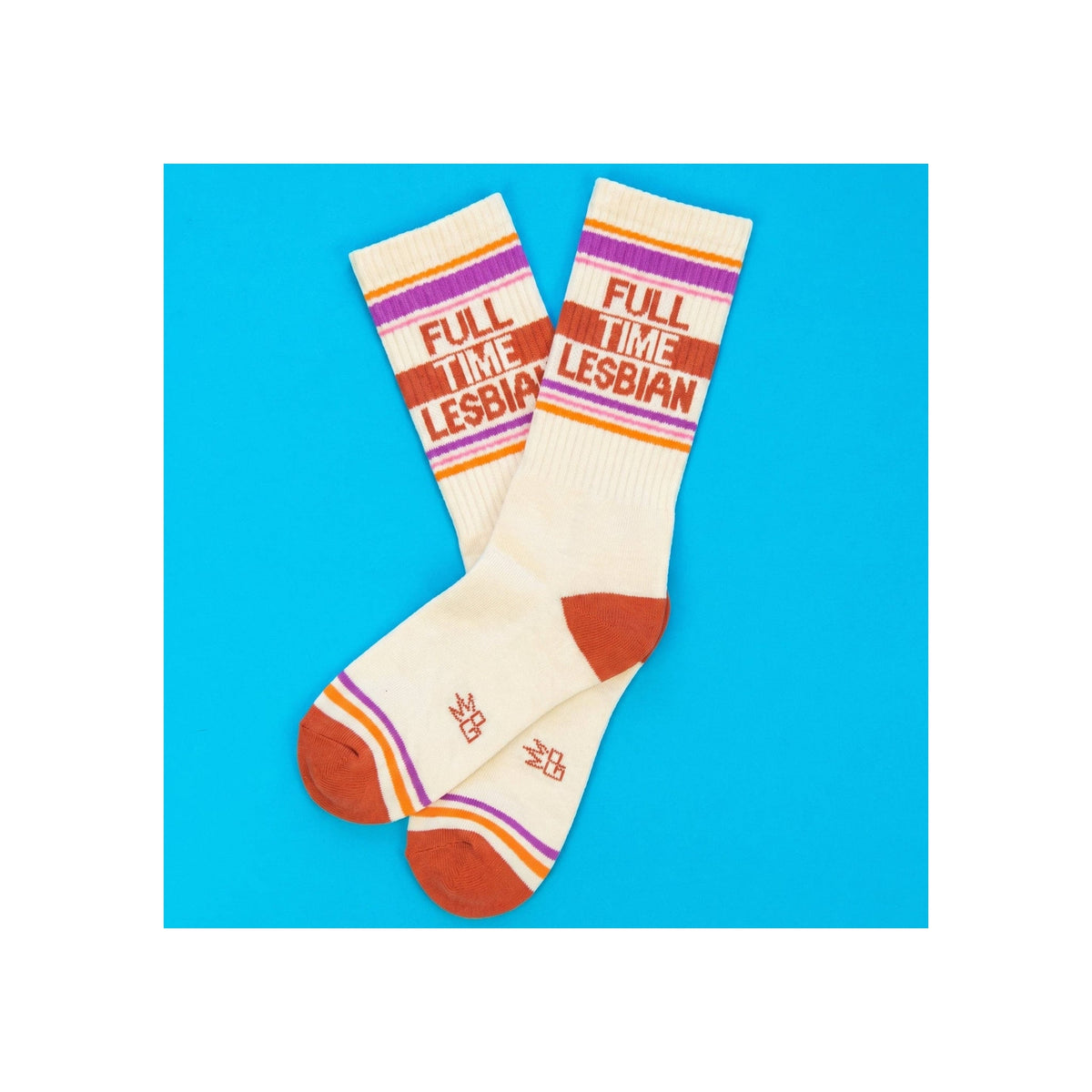 Socks, cream ribbed crew length, purple orange pink stripes, terracotta toe and heel, "Full Time Lesbian" text knitted in
