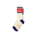 Crew socks, cream cotton with navy heel and toe, red stripe reading SLUT, laid flat