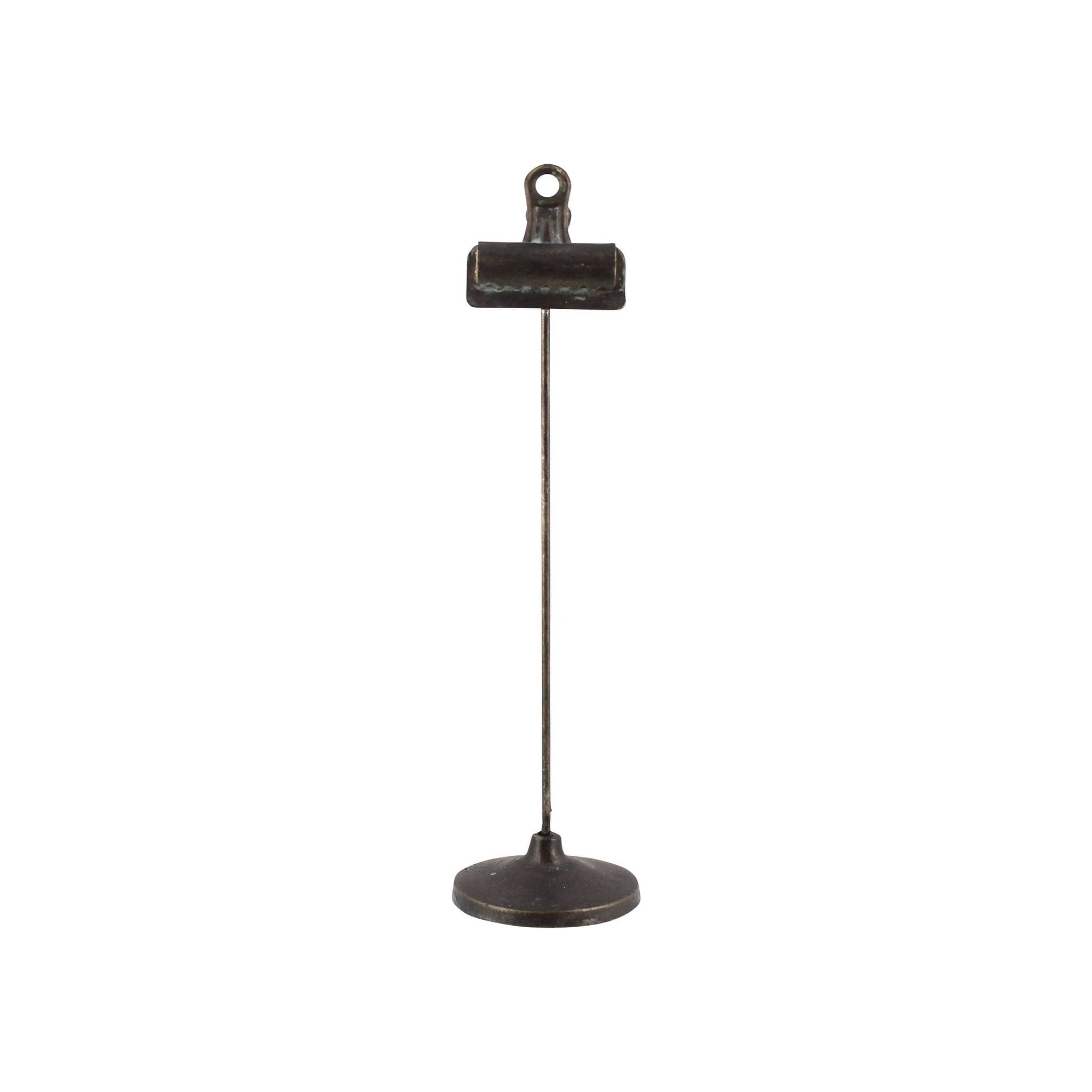 Clip-on stand with bulldog clip, tall metal rod, round base, dark black antiqued finish, upright orientation