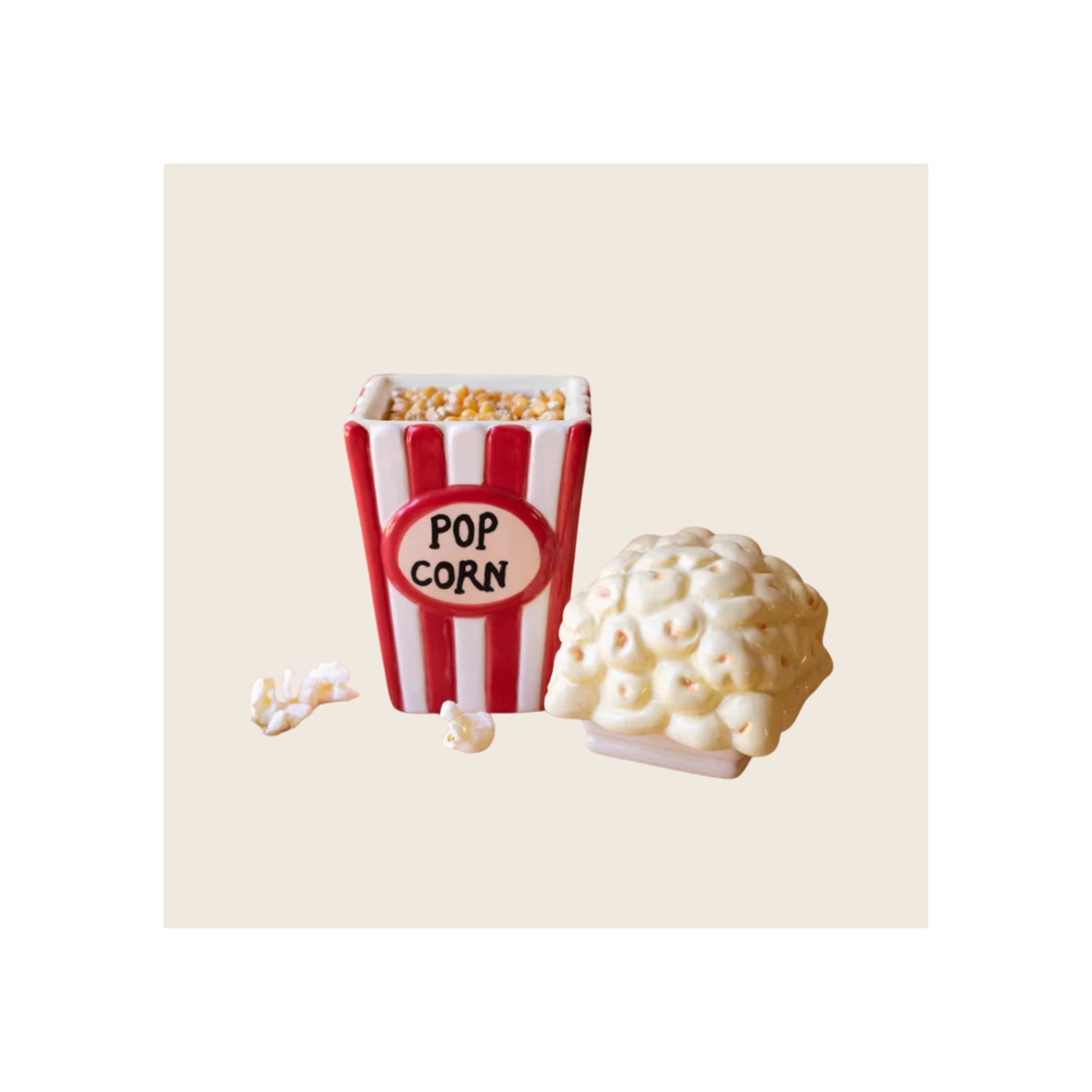 Ceramic popcorn canister, red and white striped, with removable popped-corn lid, front view