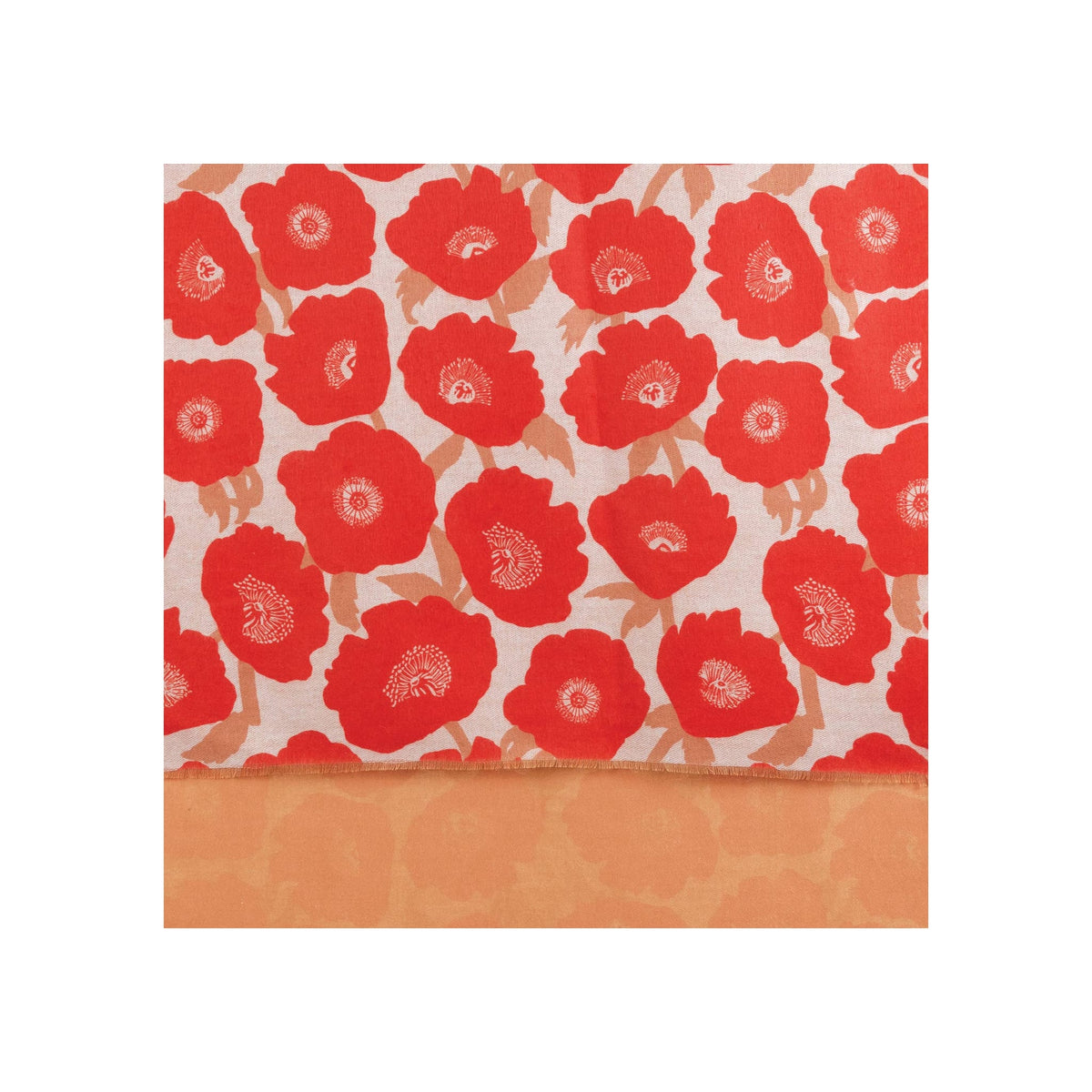 Scarf with bold red poppy floral print on cream ground, reversible peach side visible at hem with fringe edge