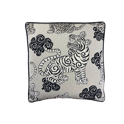 Cushion with black-and-white Tibetan tiger and cloud print on natural linen, black piped border, square format