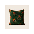 Cushion in dark emerald green velvet with orange pheasant and duck print, rust piped edging, square format, front-facing