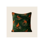 Cushion in dark emerald green velvet with orange pheasant and duck print, rust piped edging, square format, front-facing