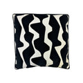 Cushion with bold black and cream wavy vertical stripe pattern, black piping trim, square format
