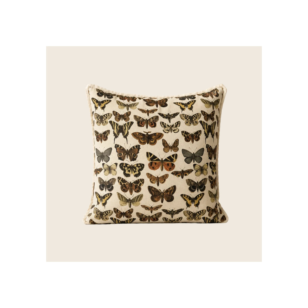 Throw pillow, cream linen fabric, all-over vintage botanical butterfly and moth print, front-facing square
