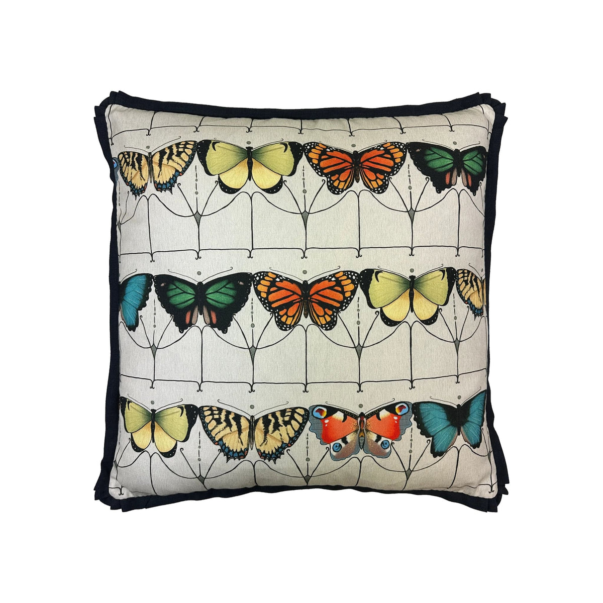 Cushion with multicolour butterfly print and black fringe trim, front view