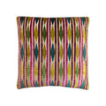Cushion with multicolour velvet geometric diamond stripe pattern in teal, pink, chartreuse, and orange, front-facing flat lay