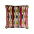 Cushion with multicolour velvet geometric diamond stripe pattern in teal, pink, chartreuse, and orange, front-facing flat lay