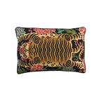 Cushion with Tibetan tiger motif, gold and black woven fabric, black piped border, landscape orientation