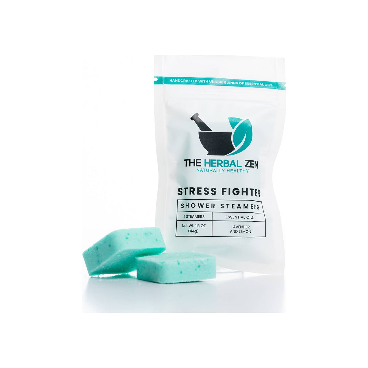 Shower steamer two-pack in white resealable pouch with teal accents, two mint-green square tablets displayed in front