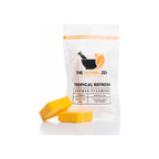 Shower steamer 2-pack in white resealable pouch, two yellow square tablets displayed in front