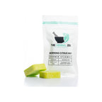 Shower steamer pouch, white resealable bag with teal accent, two yellow-green steamer tablets in front