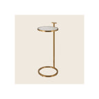 Side table with round white marble top, gold brass frame, circular base, and top handle