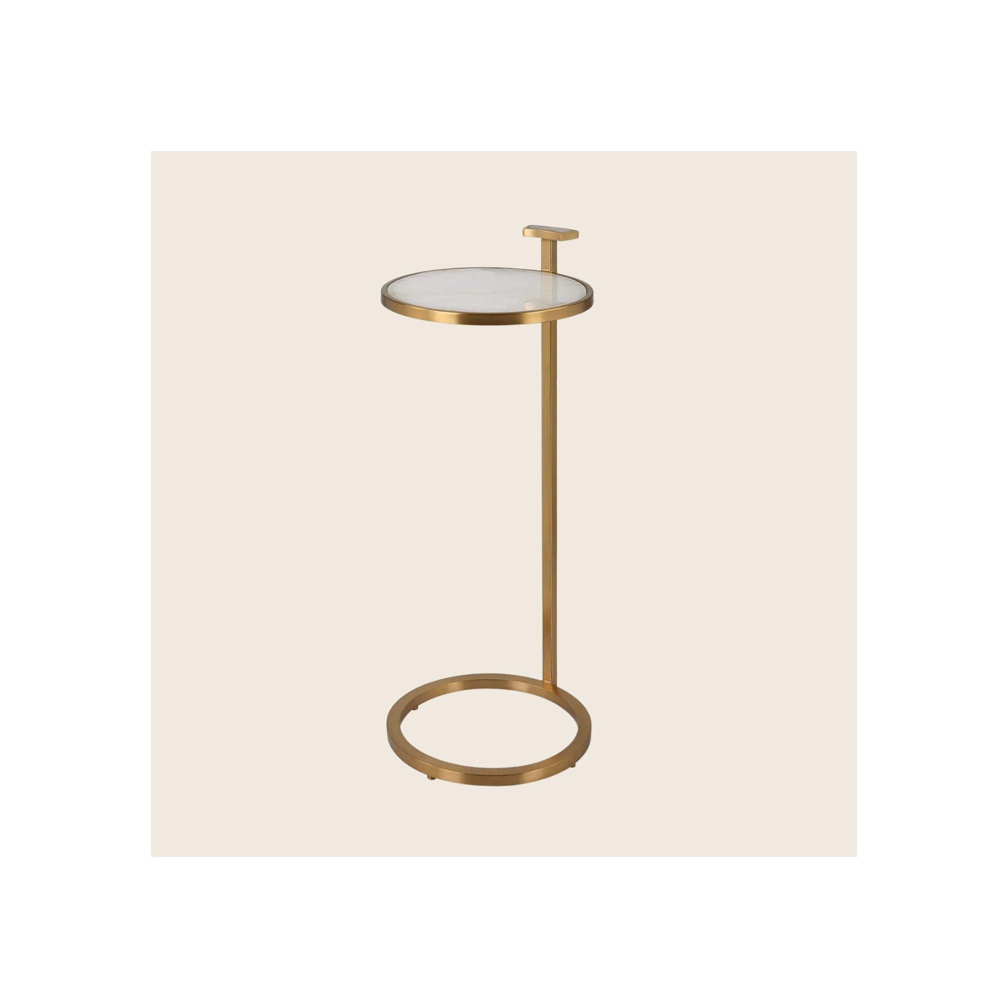 Side table with round white marble top, gold brass frame, circular base, and top handle