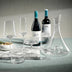 Bandol glassware collection, clear ribbed crystal, styled on teal linen with marble tray