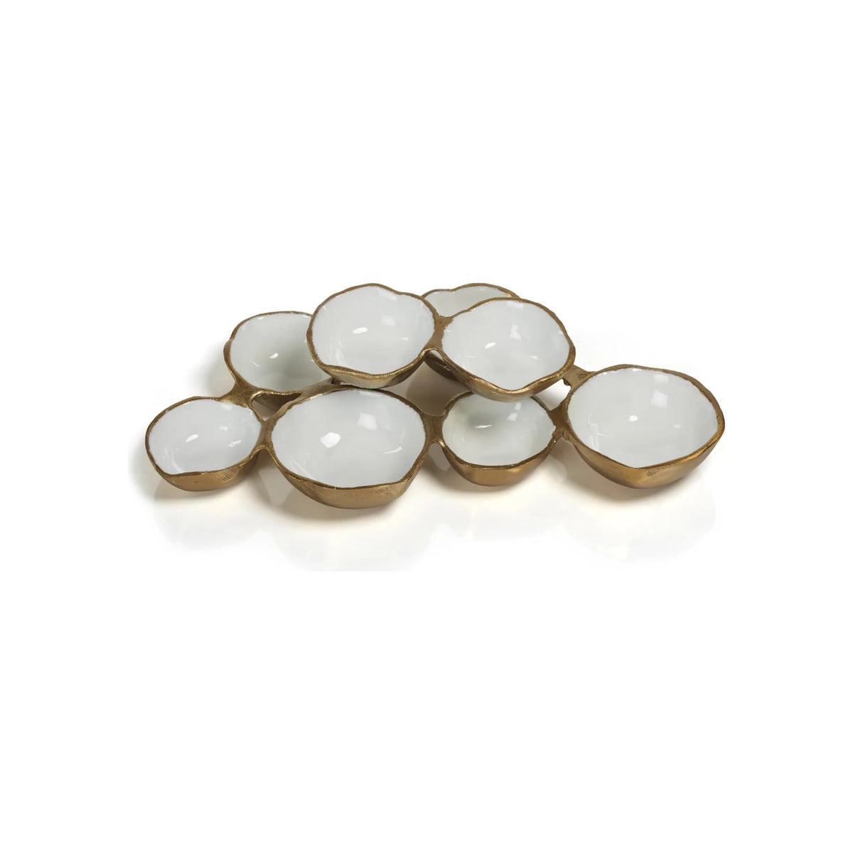 Cluster of eight small bowls, gold exterior with white glazed interior, varied sizes, top-angle view